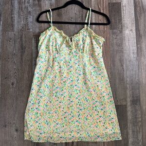 Yellow floral babydoll dress with ruffle trim and tie